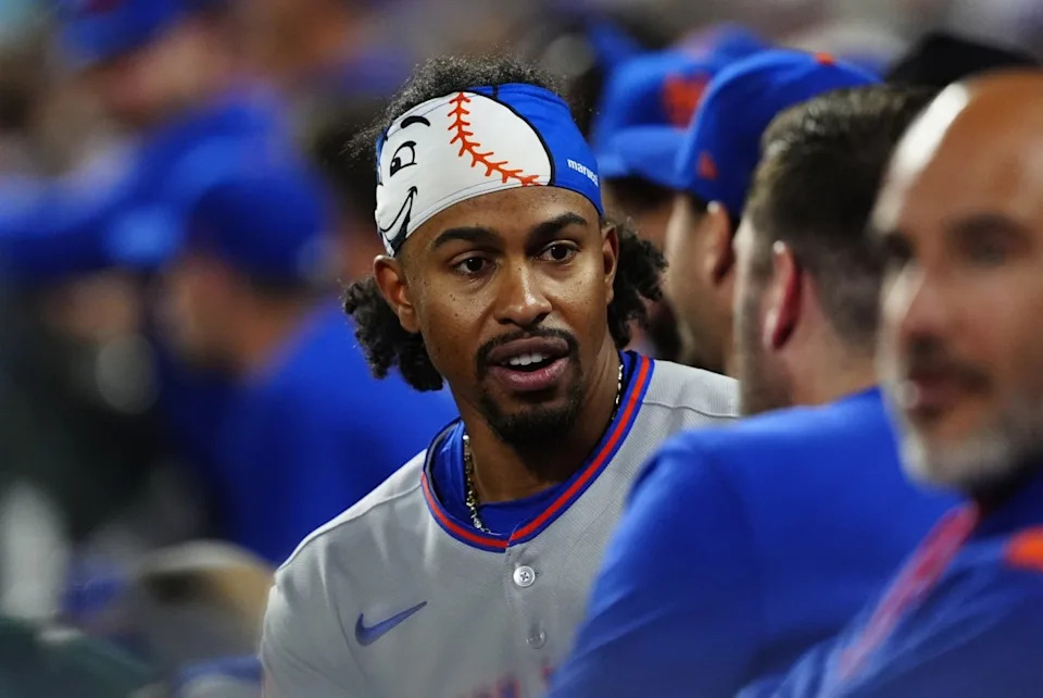 Mets shortstop Francisco Lindor (12) on the bench in the fifth inning against the Rockies at Coors Field.Ron Chenoy-Imagn Images