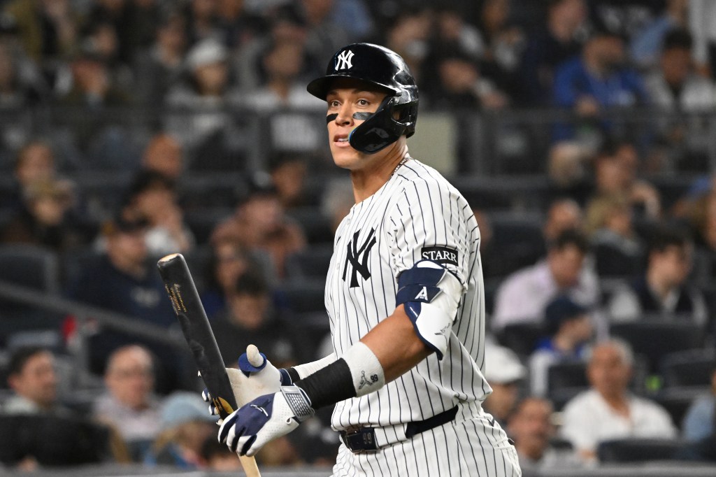 Yankees outfielder Aaron Judge (99) reacts after he strikes out during the 6th inning of the Yankees and Los Angeles Angels game at Yankee Stadium.