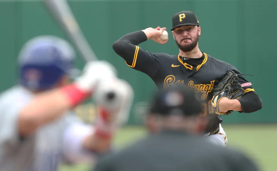 Pittsburgh Pirates starting pitcher Paul Skenes (30) delivers a pitch to Chicago Cubs designated hitter Seiya Suzuki (27) during the first inning at PNC Park.Charles LeClaire-Imagn Images