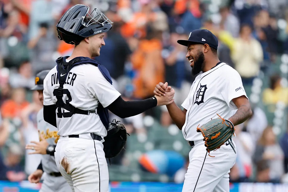 Detroit Tigers catcher Dillon Dingler (13) and pitcher Dylan Smith celebrate after defeating the Pittsburgh Pirates in Game 1 at Comerica Park in Detroit on Thursday, June 19, 2025.