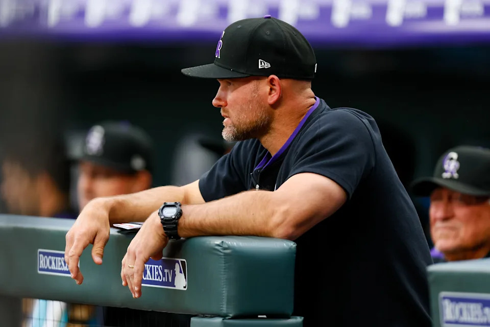 DENVER, CO - MAY 19:  Interim Manager Warren Schaeffer #34 of the Colorado Rockies looks on from the dugout in the first inning against the Philadelphia Phillies at Coors Field on May 19, 2025 in Denver, Colorado. (Photo by Justin Edmonds/Getty Images)