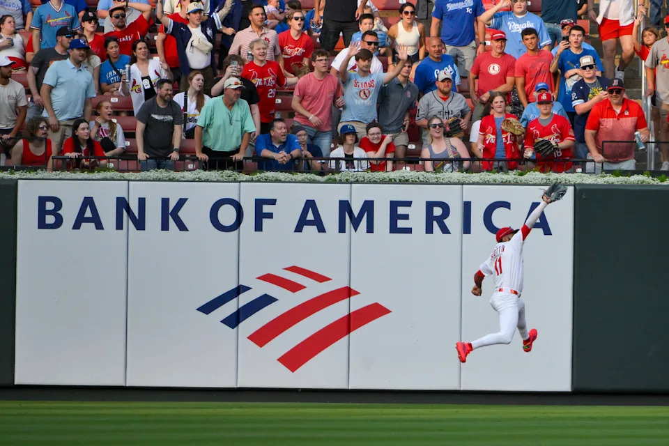 St. Louis Cardinals center fielder Victor Scott II (11) leaps and catches a line drive hit by Kansas City Royals designated hitter Jac Caglianone (not pictured)Jeff Curry-Imagn Images