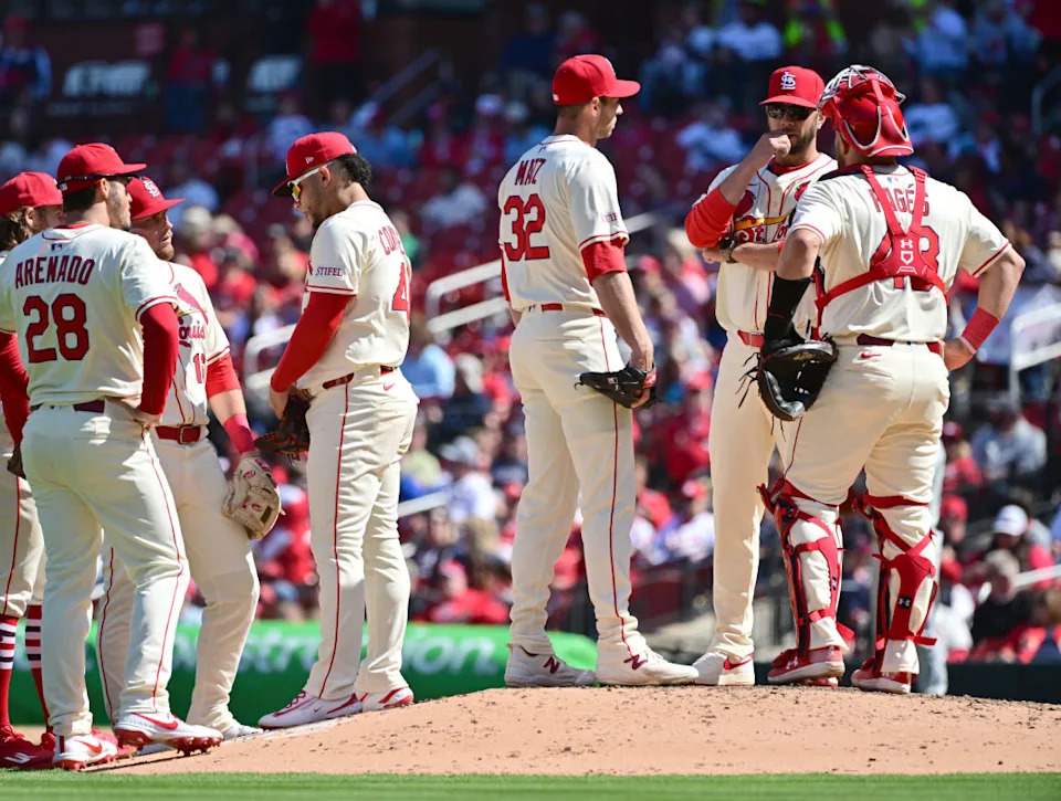 St. Louis Cardinals pitching coach Dusty Blake talks over the situation with St. Louis Cardinals pitcher Steven Matz.Tim Vizer-Imagn Images