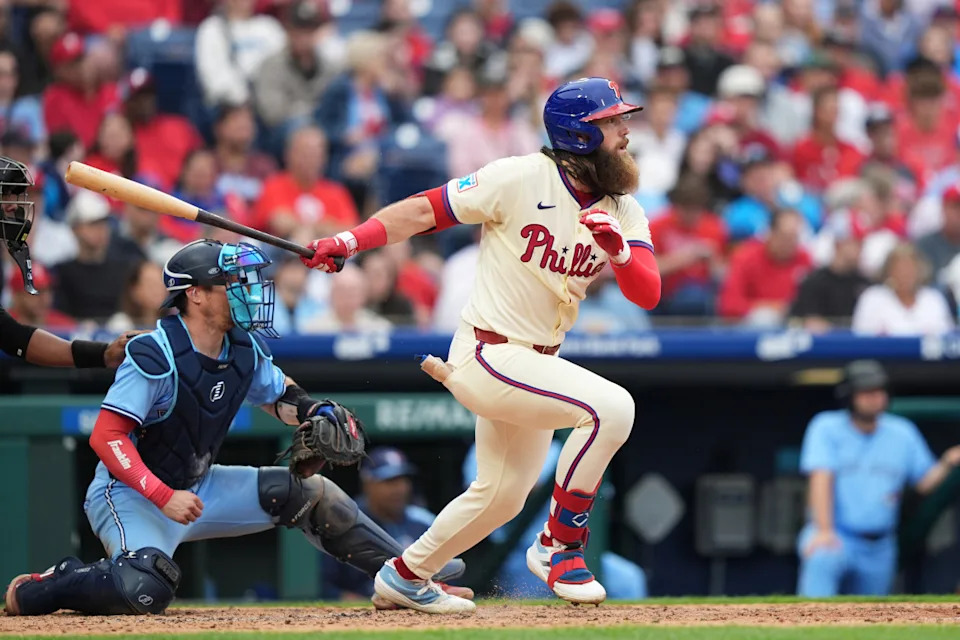 Philadelphia Phillies outfielder Brandon Marsh (16) hits a single against the Toronto Blue Jays in the fifth inning at Citizens Bank Park.Kyle Ross-Imagn Images