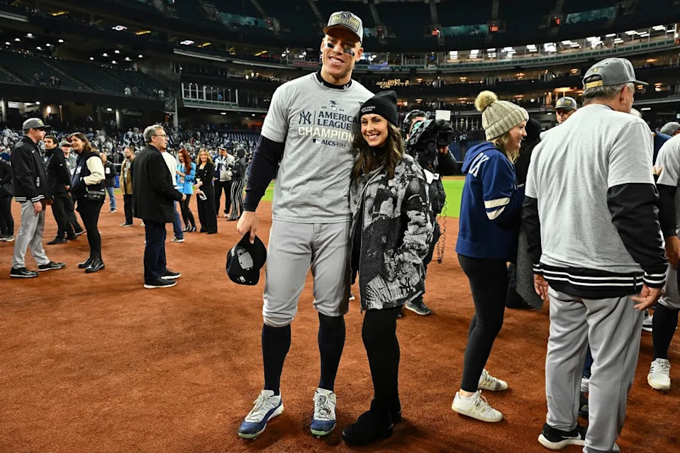Aaron Judge and his wife, Samantha, are pictured after the Yankees defeated the Guardians in October 2024. Getty Images