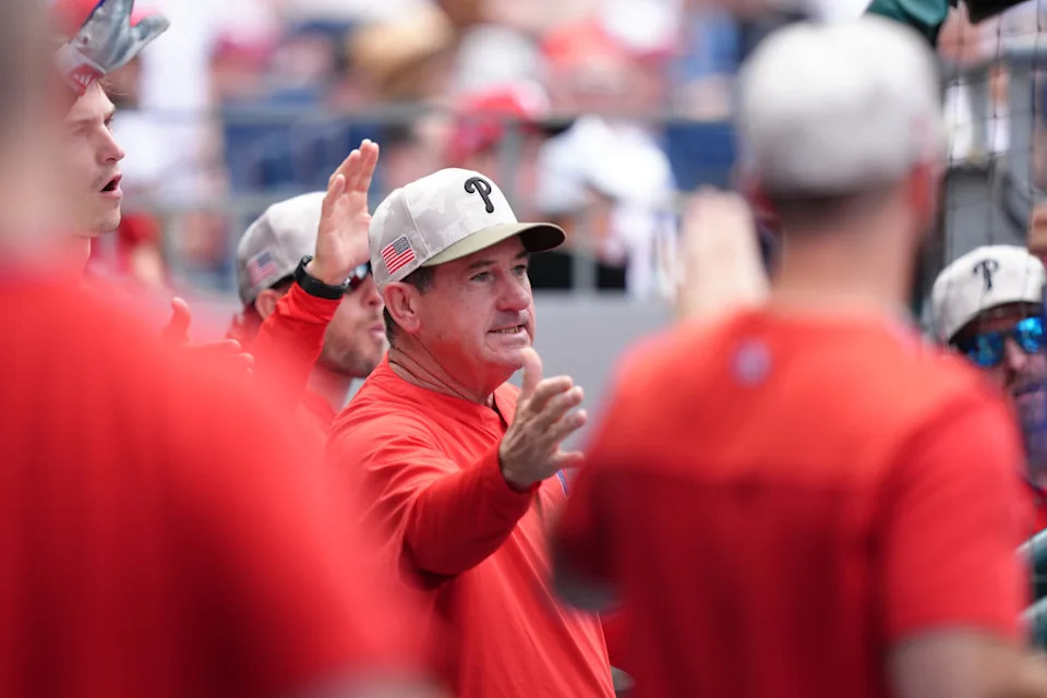 Philadelphia Phillies manager Rob Thomson (59) reacts in the dugout after a run against the Pittsburgh Pirates in the fifth inning at Citizens Bank Park.Kyle Ross-Imagn Images