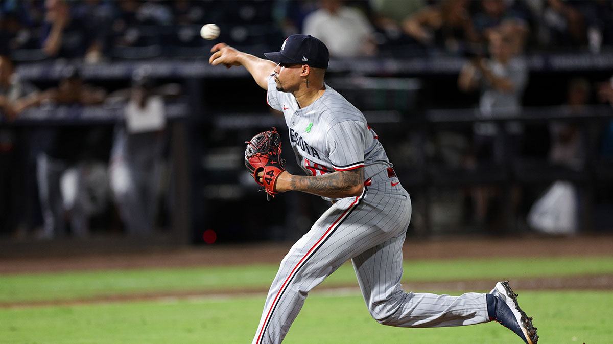 Minnesota Twins pitcher Jhoan Duran (59) throws a pitch against the Tampa Bay Rays in the ninth inning at George M. Steinbrenner Field
