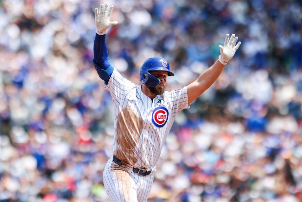 Chicago Cubs first base Michael Busch (29) celebrates after hitting a two-run home run during the third inning against the Cincinnati Reds at Wrigley Field on Sunday, June 1, 2025. (Eileen T. Meslar/Chicago Tribune)