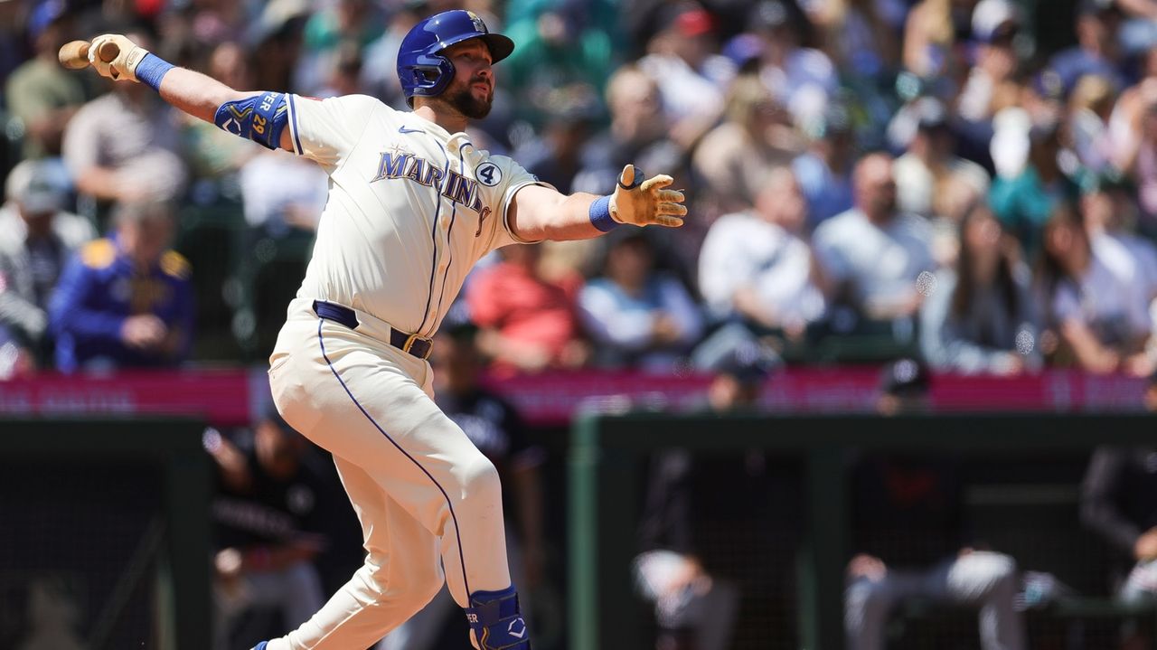 Mariners slugger Cal Raleigh leads MLB in homers and is on pace to set a season record for catchers