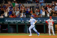 Texas Rangers first baseman Josh Smith (8) rounds the bases after a two-run home run during...