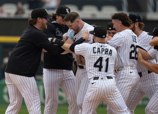 Chicago White Sox first baseman Tim Elko celebrates his game-winning hit with teammates to defeat the Detroit Tigers on Thursday, June 5, 2025, at Rate Field. (Brian Cassella/Chicago Tribune)