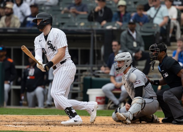 White Sox first baseman Tim Elko follows through on his game-winning single in the 10th inning to defeat the Tigers on June 5, 2025, at Rate Field. (Brian Cassella/Chicago Tribune)