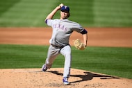 Texas Rangers starting pitcher Jacob deGrom throws during the second inning of a baseball...