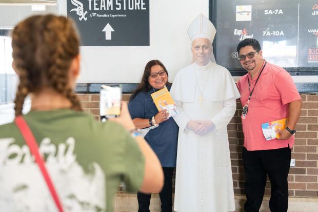 Maria Marin and her husband, Martin Marin, pose with a...
