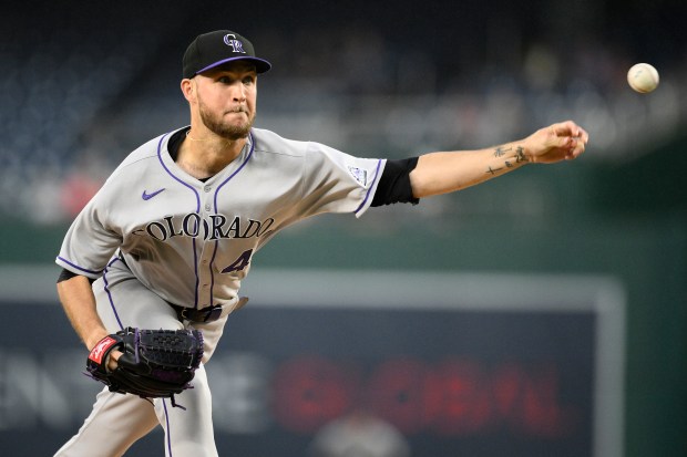 Colorado Rockies starting pitcher Carson Palmquist throws during the first inning of a baseball game against the Washington Nationals, Monday, June 16, 2025, in Washington. (AP Photo/Nick Wass)