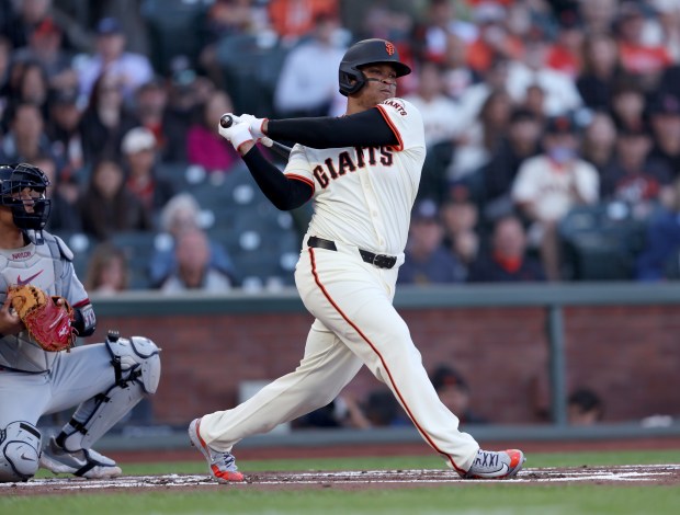 San Francisco Giants designated hitter Rafael Devers #16 strikes out...