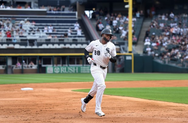 White Sox center fielder Luis Robert Jr. rounds the bases after hitting a solo home run against the Diamondbacks on Tuesday, June 24, 2025, at Rate Field. (Chris Sweda/Chicago Tribune)