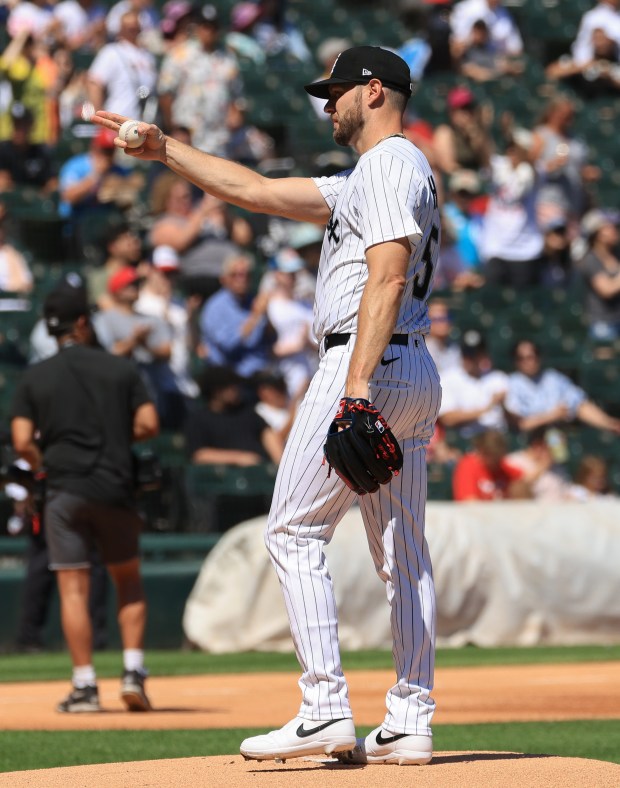 White Sox starting pitcher Adrian Houser gestures a greeting to the plate umpire at the start of a game against the Giants on Saturday, June 28, 2025, at Rate Field. (John J. Kim/Chicago Tribune)