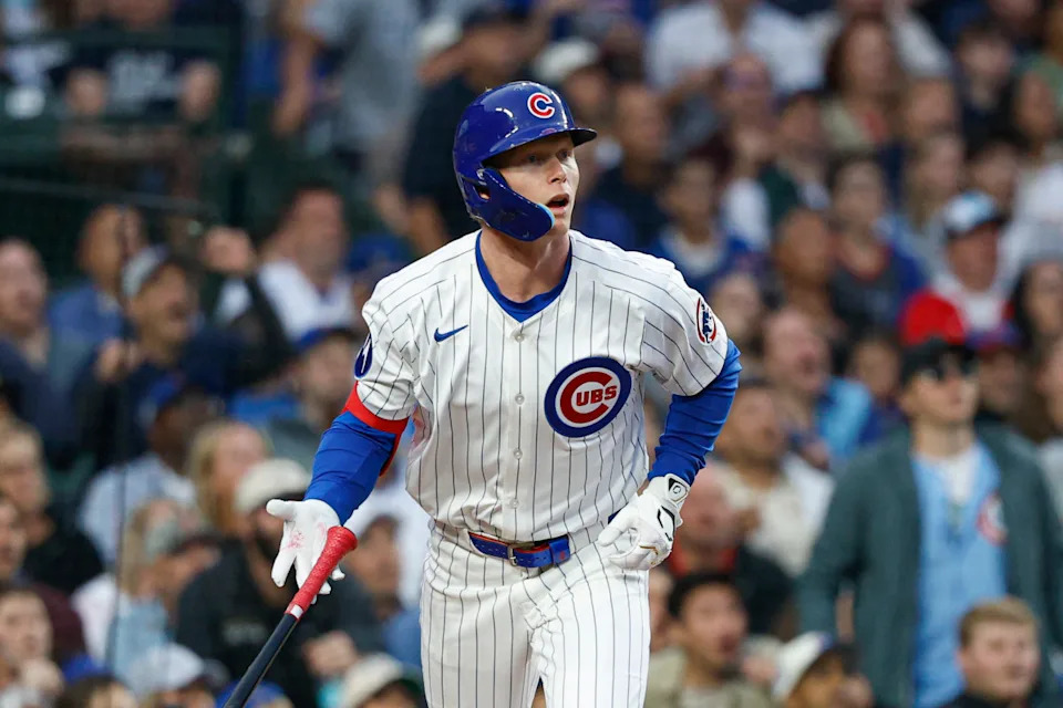 Chicago Cubs center fielder Pete Crow-Armstrong (4) hits a two-run home run against the Pittsburgh Pirates during the fourth inning at Wrigley Field.Kamil Krzaczynski-Imagn Images