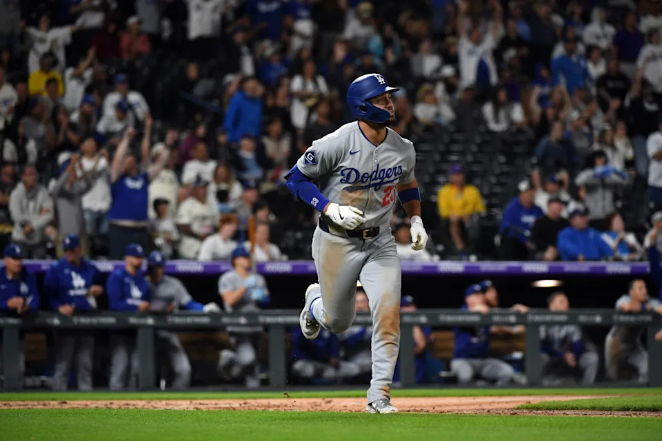 Los Angeles Dodgers outfielder Michael Conforto (23) watches a home run during the eighth inning against the Colorado Rockies at Coors Field.Christopher Hanewinckel-Imagn Images