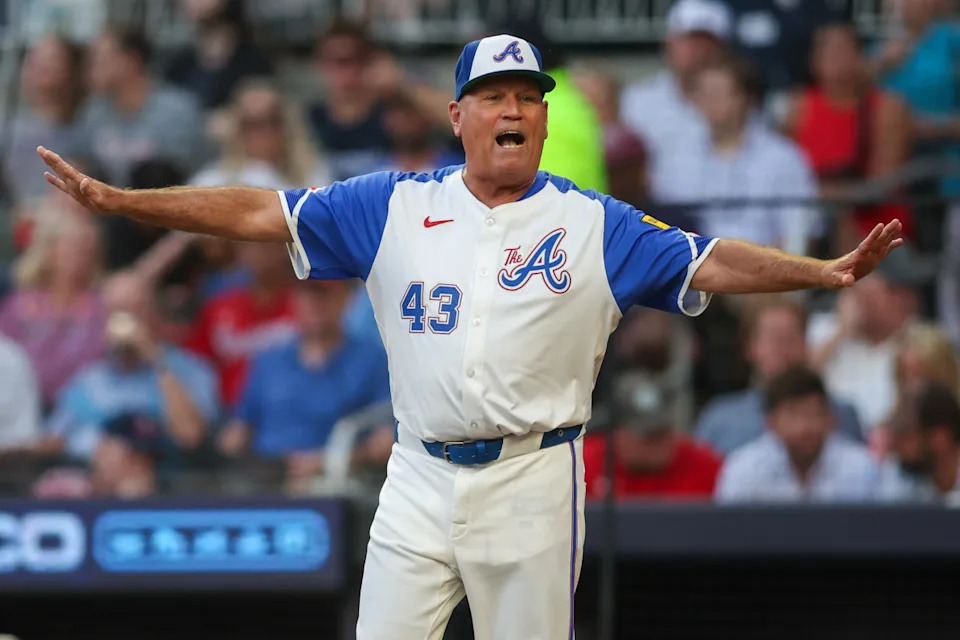 Atlanta Braves manager Brian Snitker (43) argues with umpires against the Washington Nationals in the second inning at Truist Park.Brett Davis-Imagn Images