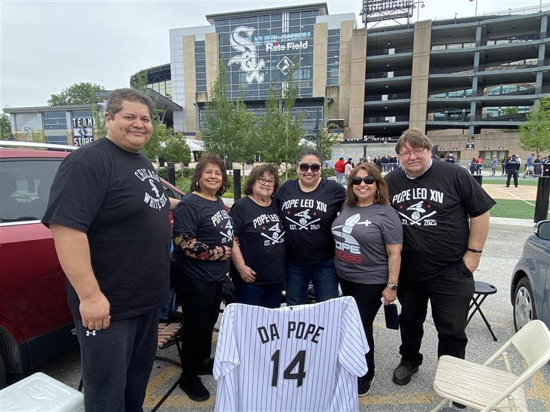 White Sox fan Maria Rosales (second from right) celebrates with her family members outside Rate Field in Chicago on June 14, 2025, prior to a special Mass marking the election of Pope Leo XIV, a Chicago native. Photo by Jonathan Liedl/National Catholic Register