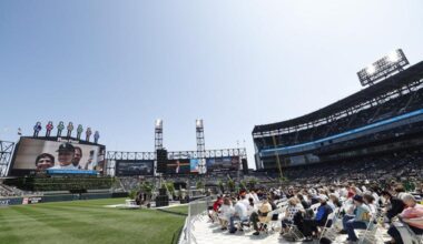 Catholic faithful attend a celebration and Mass held in honor of Pope Leo XIV at Rate Field, home of the  White Sox, in Chicago on June 14, 2025.