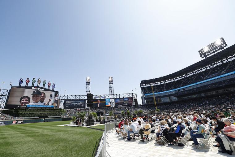Catholic faithful attend a celebration and Mass held in honor of Pope Leo XIV at Rate Field, home of the  White Sox, in Chicago on June 14, 2025.