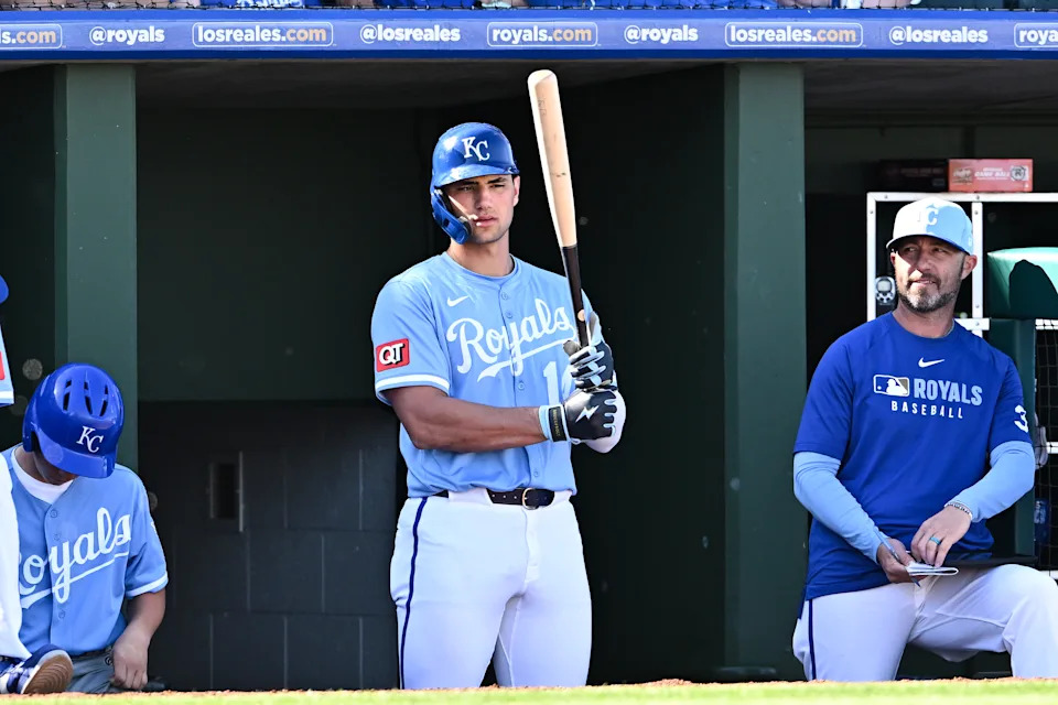 SURPRISE, ARIZONA - FEBRUARY 21, 2025: Jac Caglianone #14 of the Kansas City Royals looks on during the eighth inning of a spring training game against the Texas Rangers at Surprise Stadium on February 21, 2025 in Surprise, Arizona. (Photo by Chris Bernacchi/Diamond Images via Getty Images)