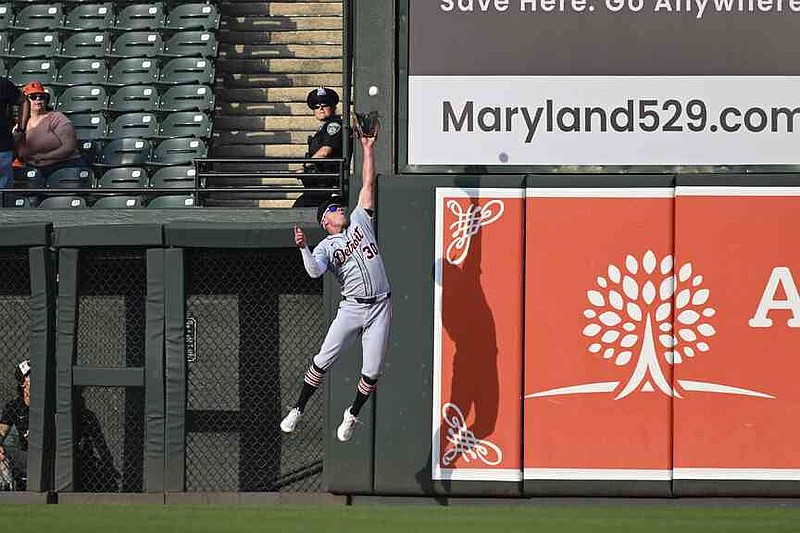 Detroit Tigers outfielder Kerry Carpenter (30) catches a fly ball hit by Baltimore Orioles' Jordan Westburg off Tigers pitcher Tarik Skubal during the first inning of a baseball game in Baltimore, Thursday, June 12, 2025. (AP Photo/Terrance Williams)