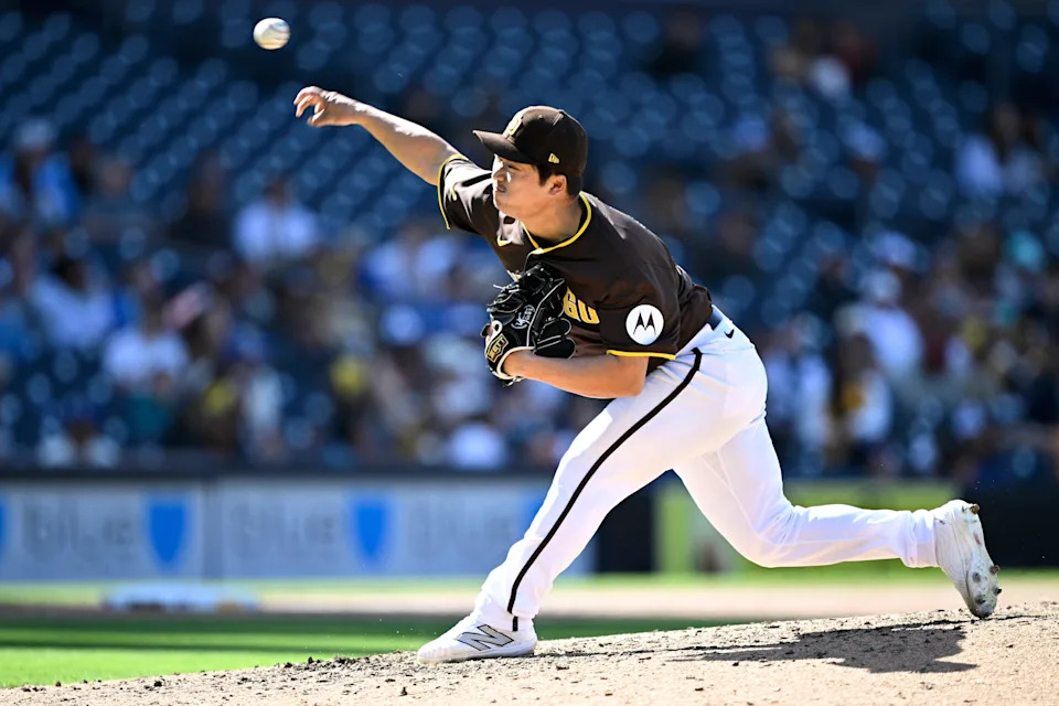San Diego Padres relief pitcher Woo-Suk Go (21) throws a pitch against the Seattle Mariners during the ninth inning at Petco Park in San Diego on March 26, 2024.