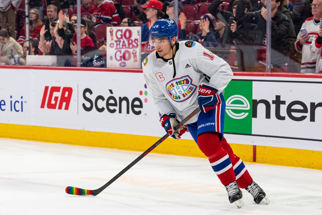 Nick Suzuki of the Montreal Canadiens wearing the Pride Night jersey during warm-ups before a game with the Washington Capitals at the Bell Centre on April 6, 2023 in Montreal.