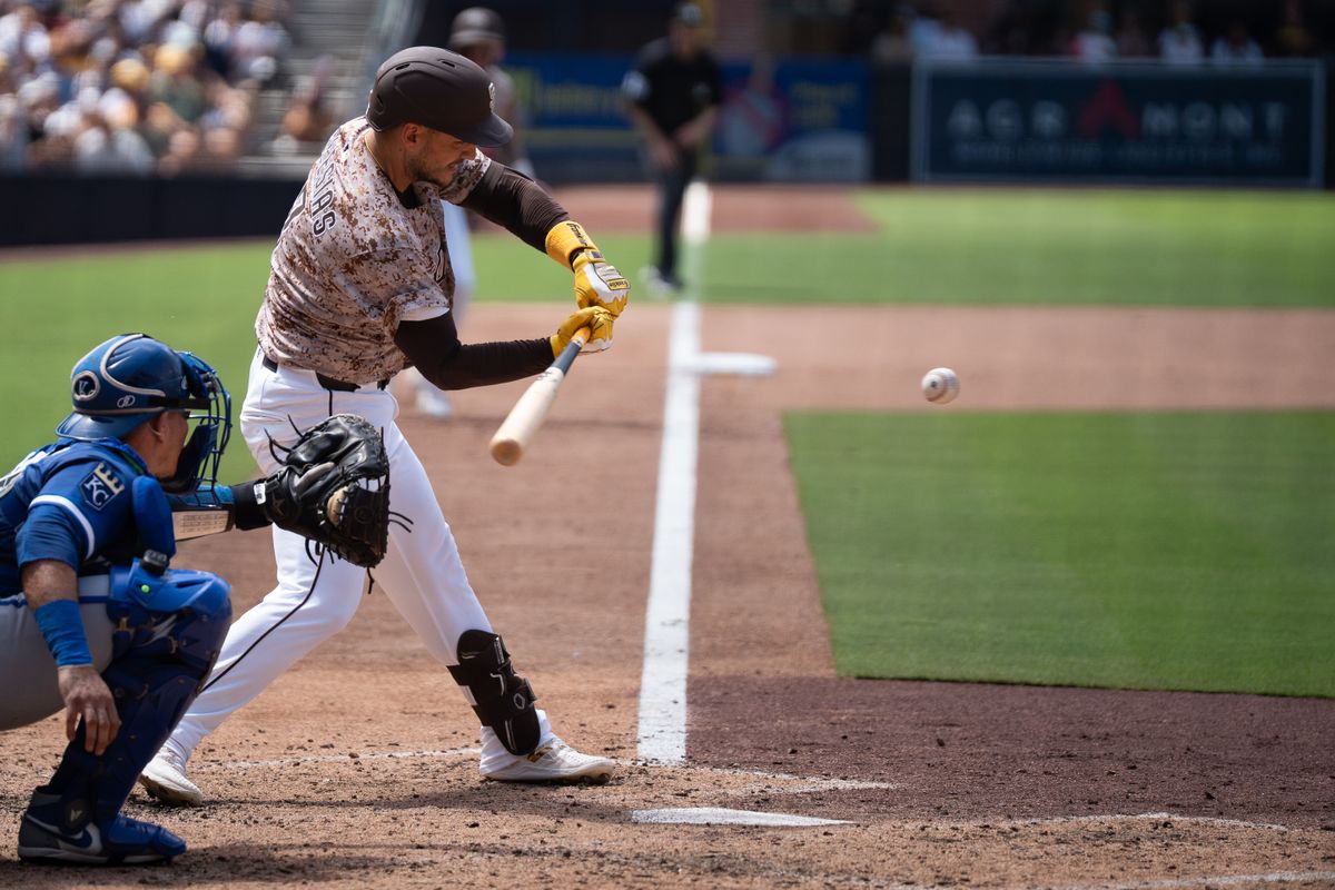 San Diego Padres infielder José Iglesias (7) hits the ball during an MLB game against the Kansas City Royals on June 22, 2025 at Petco Park in San Diego, CA.