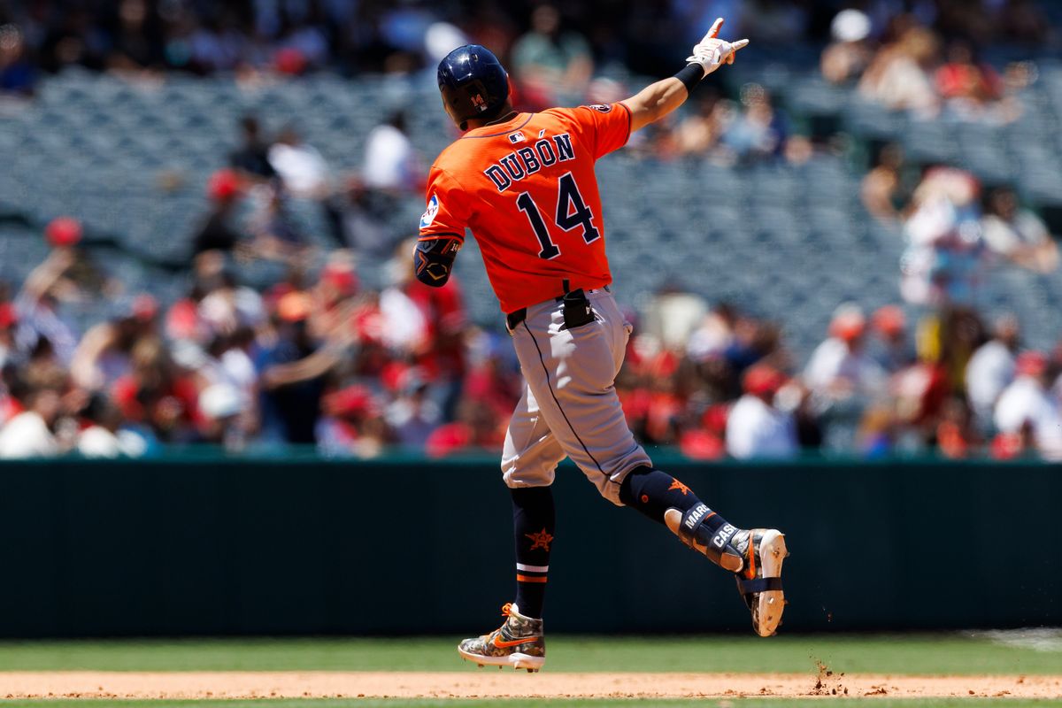 Mauricio Dubón #14 of the Houston Astros celebrates his home run during the game against the Los Angeles Angels at Angel Stadium of Anaheim on June 22, 2025 in Anaheim, California.