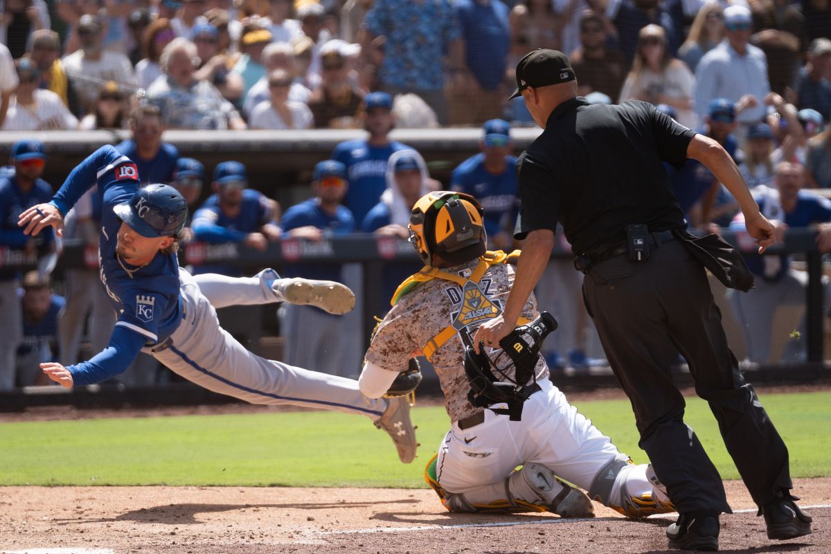 San Diego Padres catcher Elias Díaz (17) tags out Kansas City Royals outfielder Drew Waters (8) during an MLB game on June 22, 2025 at Petco Park in San Diego, CA.