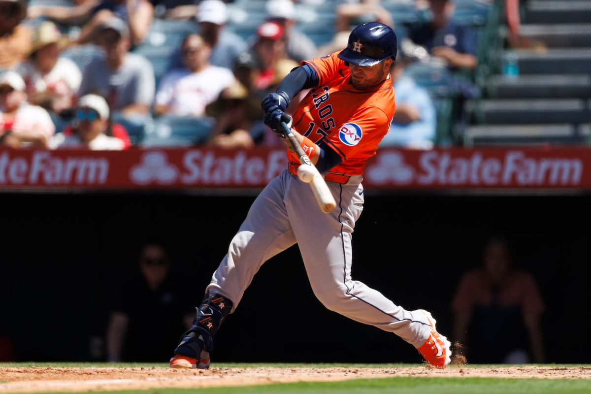 Victor Caratini #17 of the Houston Astros hits during the game against the Los Angeles Angels at Angel Stadium of Anaheim on June 22, 2025 in Anaheim, California. 