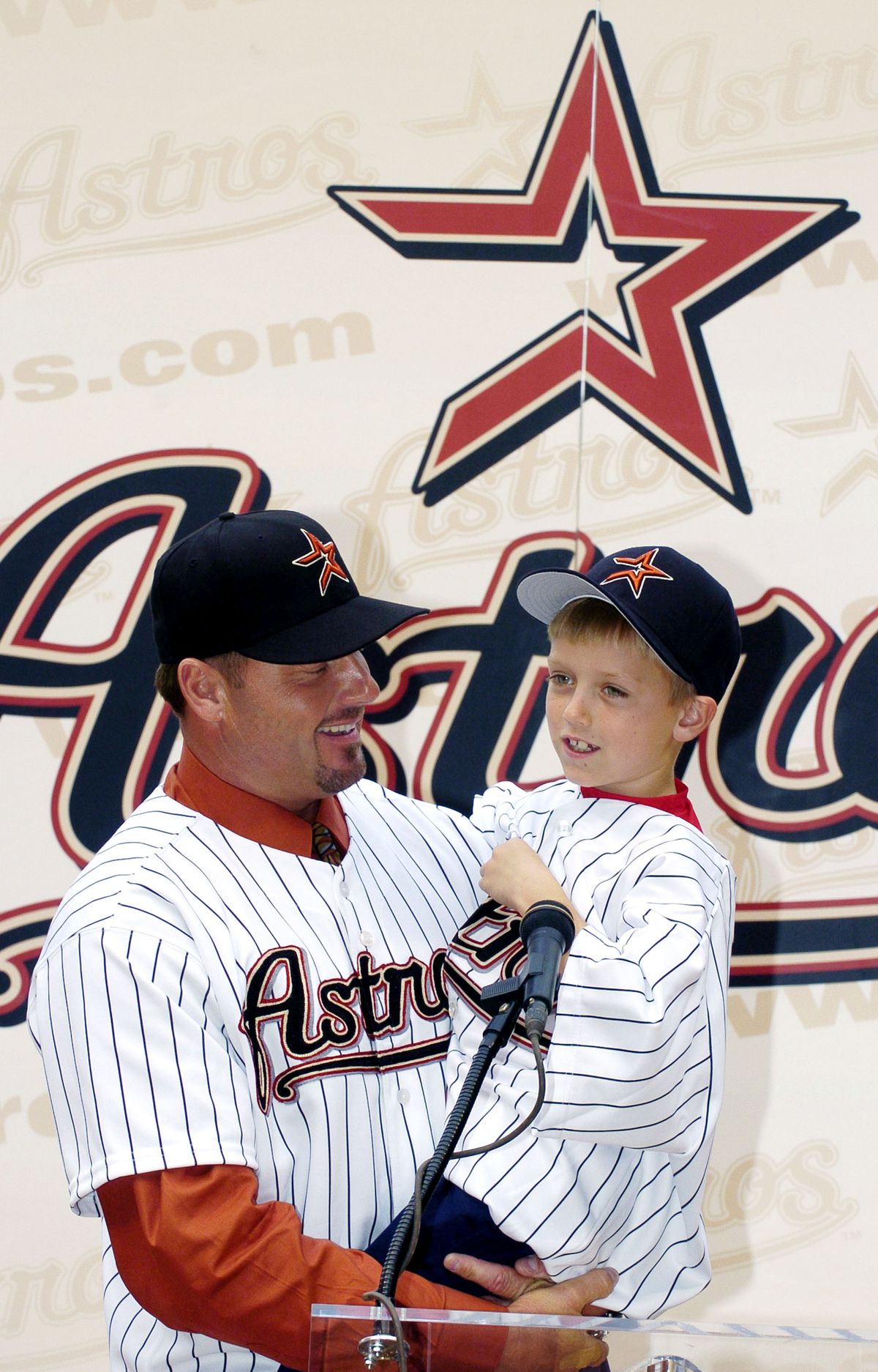 Roger Clemens signs with the Houston Astros