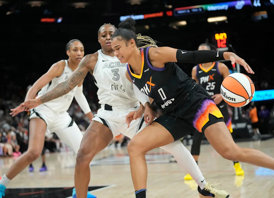 Phoenix Mercury forward Satou Sabally (0) is defended by Las Vegas Aces guard Tiffany Mitchell (3) during the third quarter at PHX Arena Jun 29, 2025.