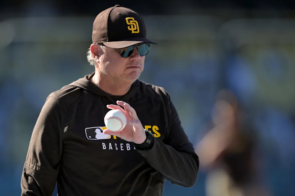 San Diego Padres manager Mike Shildt (8) warms up players prior to the game against the Los Angeles Dodgers at Dodger Stadium.Jayne Kamin-Oncea-Imagn Images