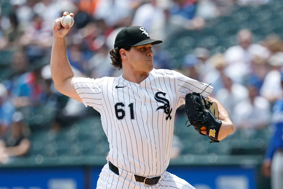 Chicago White Sox starting pitcher Mike Vasil (61) delivers a pitch against the Kansas City Royals during the first inning at Rate Field on June 8, 2025.