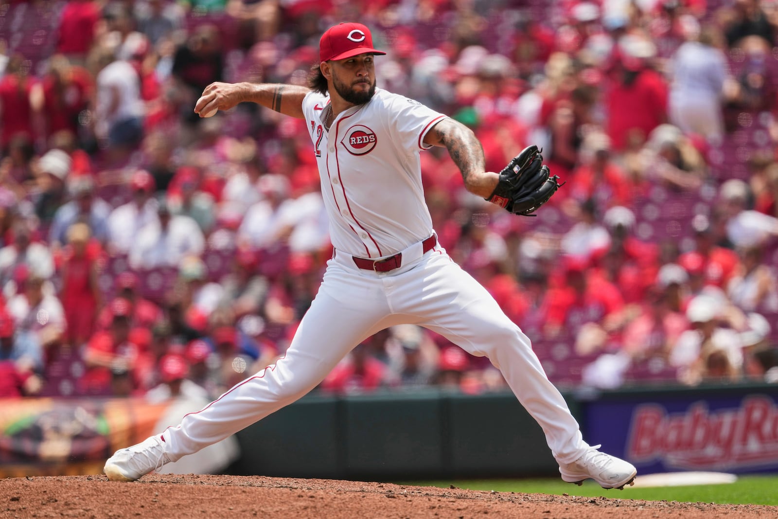 Cincinnati Reds' Lyon Richardson delivers a pitch in the seventh inning of a baseball game against the Milwaukee Brewers, Wednesday, June 4, 2025, in Cincinnati. (AP Photo/Kareem Elgazzar)