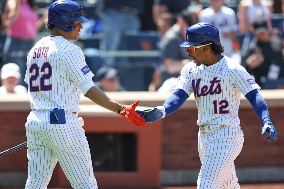 New York Mets shortstop Francisco Lindor (12) and right fielder Juan Soto (22).© Vincent Carchietta-Imagn Images