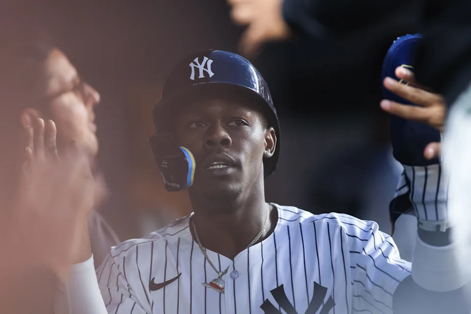 NEW YORK, NEW YORK - JUNE 03: Jazz Chisholm Jr. #13 of the New York Yankees is greeted by teammates in the dugout after scoring a run during the fifth inning of the game against the Cleveland Guardians at Yankee Stadium on June 03, 2025 in New York City. (Photo by Dustin Satloff/Getty Images)