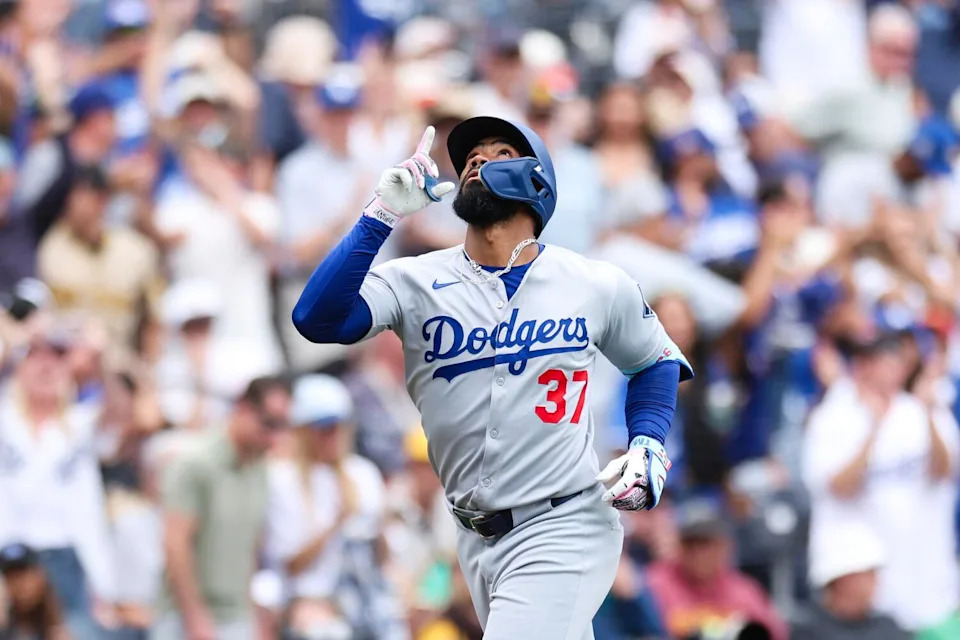 Teoscar Hernández circles the bases after his three-run homer.