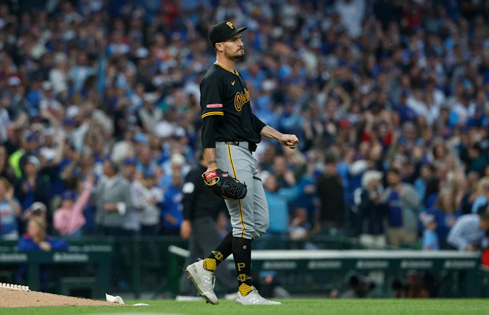 Jun 12, 2025; Chicago, Illinois, USA; Pittsburgh Pirates starting pitcher Andrew Heaney (45) reacts after giving up a two-run home run to Chicago Cubs center fielder Pete Crow-Armstrong during the fourth inning at Wrigley Field.Kamil Krzaczynski-Imagn Images