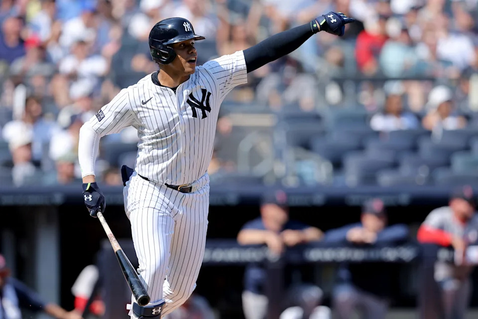Sep 14, 2024; Bronx, New York, USA; New York Yankees right fielder Juan Soto (22) reacts after hitting a single against the Boston Red Sox during the third inning at Yankee Stadium. Mandatory Credit: Brad Penner-Imagn Images