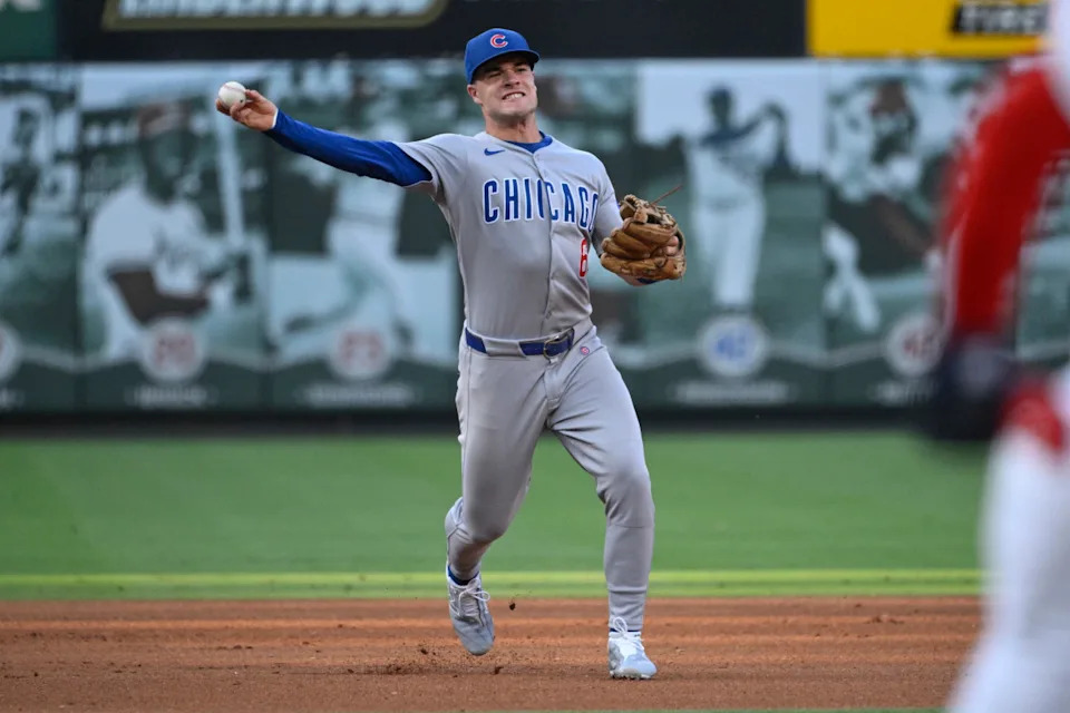 Chicago Cubs third baseman Matt Shaw (6) throws to first for an out against the St. Louis Cardinals in the fourth inning at Busch Stadium.Joe Puetz-Imagn Images