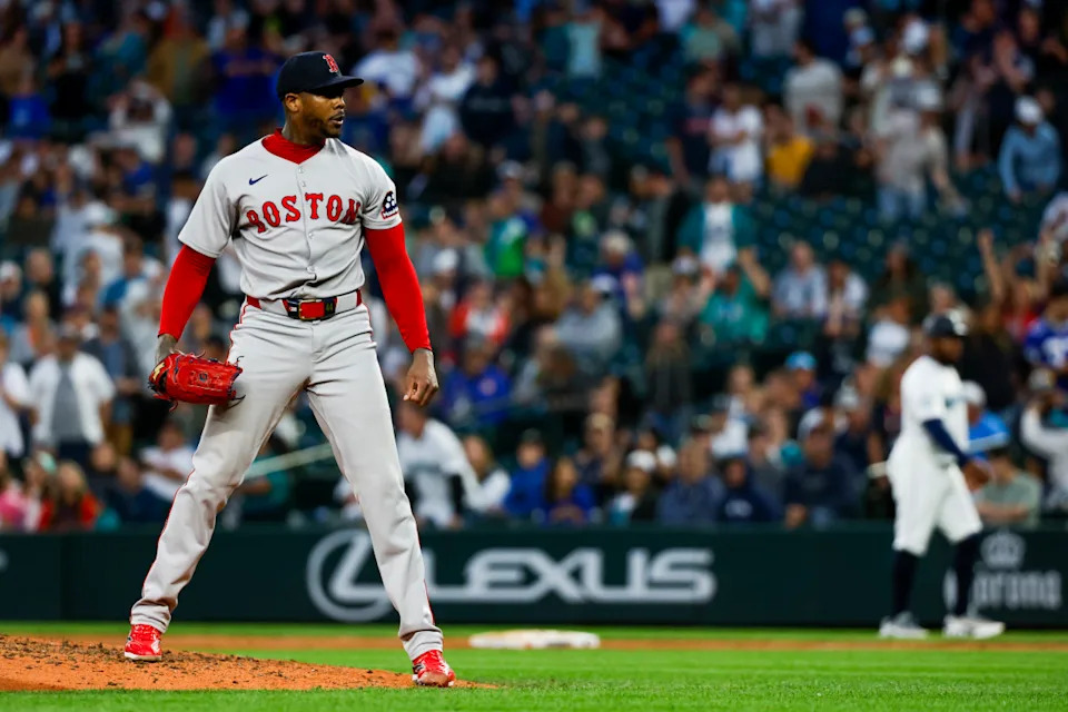 Boston Red Sox relief pitcher Aroldis Chapman (44) reacts following the final out of a victory against the Seattle Mariners at T-Mobile Park.Joe Nicholson-Imagn Images