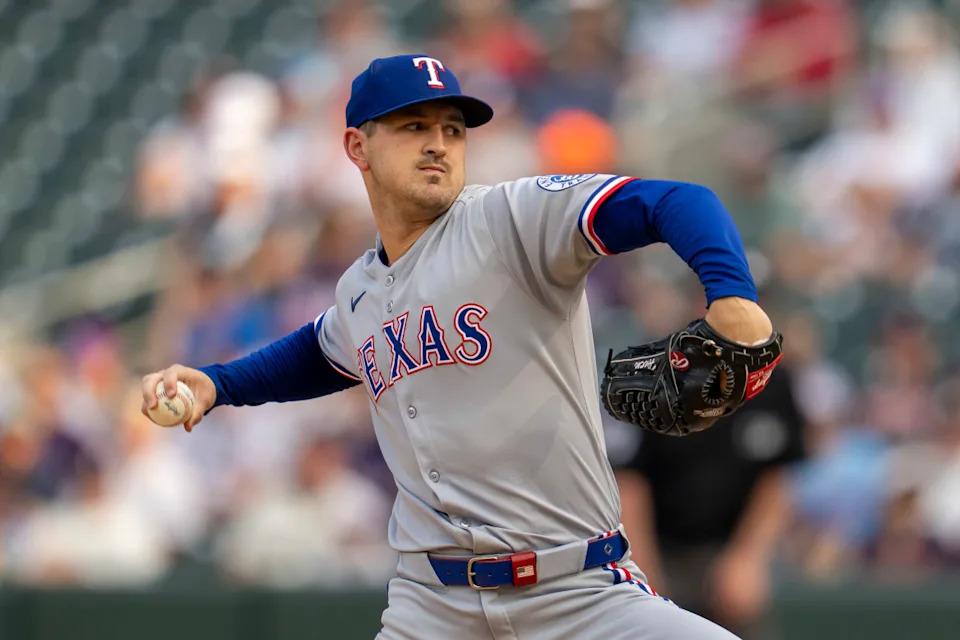 Texas Rangers starting pitcher Tyler Mahle delivers a pitch against the Minnesota Twins in the first inning at Target Field.Jesse Johnson-Imagn Images