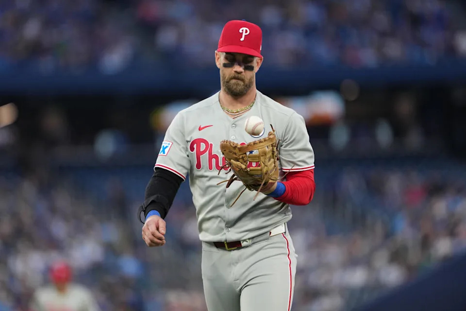 Philadelphia Phillies first baseman Bryce Harper (3) walks towards the dugout after the third out against the Toronto Blue Jays during the fourth inning at Rogers Centre.Nick Turchiaro-Imagn Images